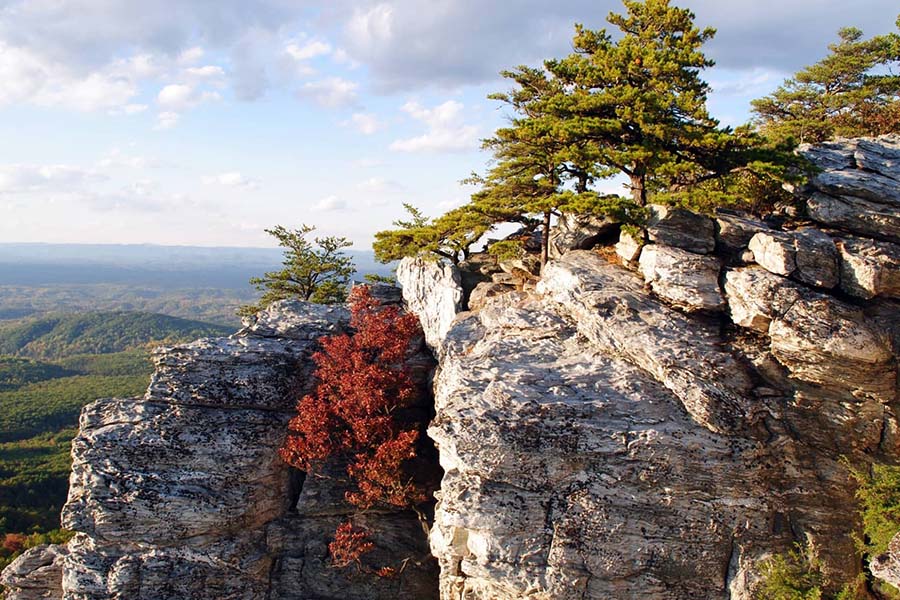 Community Involvement - iew of Hanging Rock Mountain Range in Piedmont North Carolina Against a Blue Sky